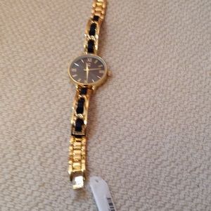 Charm Charlie gold tone with black braid watch.#12